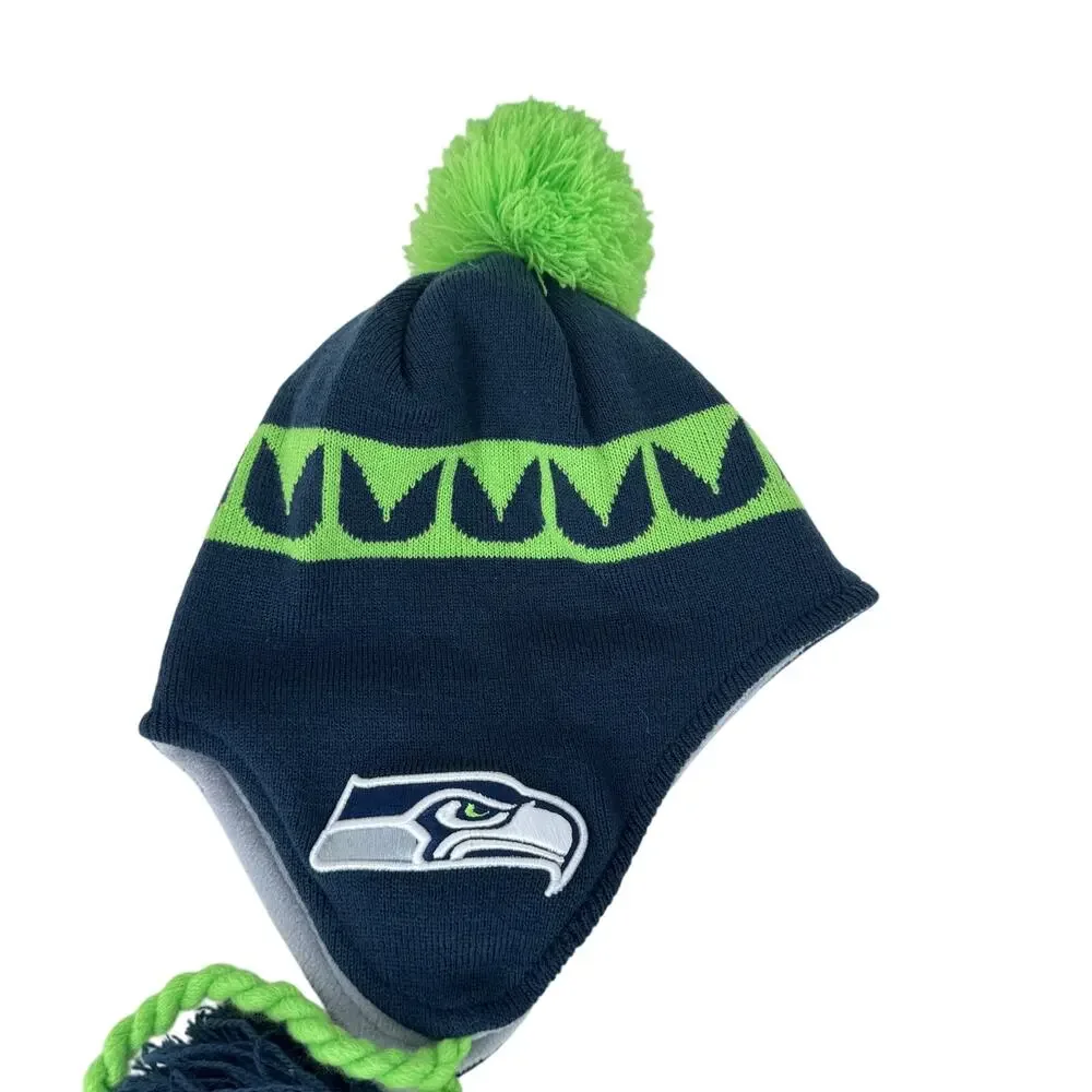 New Era Seattle Seahawks Jacquard Tassel Beanie Hat with Pom Blue Green‎ Youth